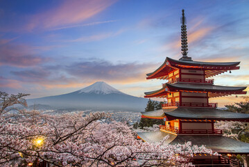 Fujiyoshida, Japan Beautiful view of mountain Fuji and Chureito pagoda at sunset, japan in the spring with cherry blossoms