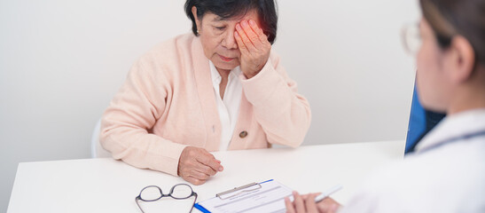 Elderly woman Patient having Eye ache and consulting Doctor to Eye disease. Senior Medical...