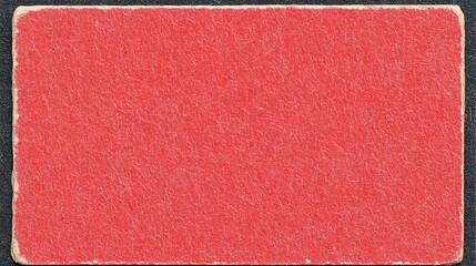 Vintage crimson cardstock surface showcasing subtle textures and aged appeal