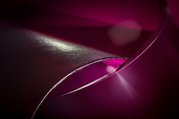 Soft, smooth gradient from deep purple to pink with light reflections.

