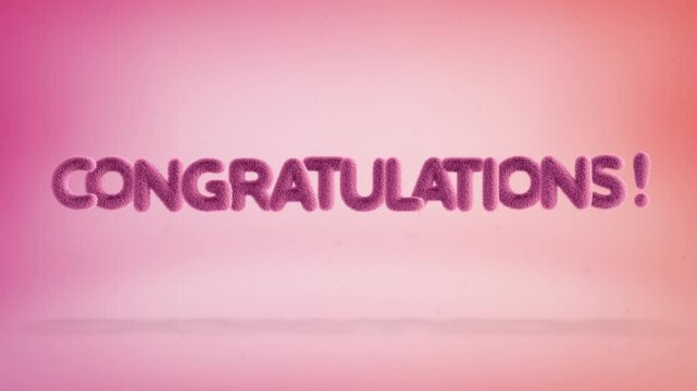Congratulations text of 3D pink fluffy letters on a simple gradient background with particles. Looped animation