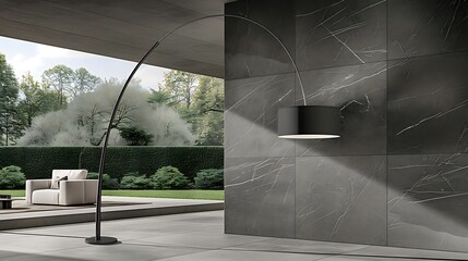 Sophisticated arc lamp illuminating a modern architectural space with marble wall
