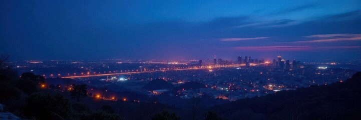 Naklejka premium Deep blue twilight, city lights begin to gleam against darkening sky, light, high rise, modern