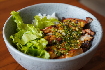 Thai chicken dish, captured on April 16, 2025. Flavorful and aromatic, made with tender chicken, herbs, and spices, offering a bold and savory taste of Thai cuisine