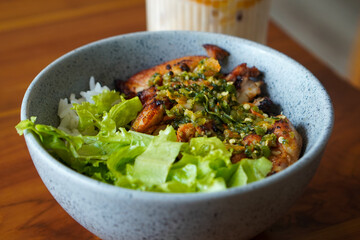 Thai chicken dish, captured on April 16, 2025. Flavorful and aromatic, made with tender chicken, herbs, and spices, offering a bold and savory taste of Thai cuisine