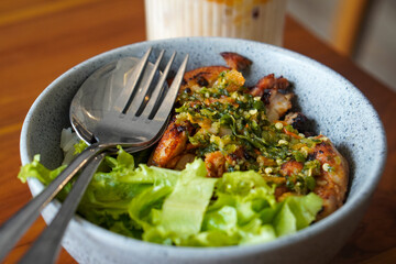 Thai chicken dish, captured on April 16, 2025. Flavorful and aromatic, made with tender chicken, herbs, and spices, offering a bold and savory taste of Thai cuisine