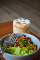 Butterscotch coffee, captured on April 16, 2025. A creamy and aromatic drink with rich espresso and sweet butterscotch flavor, perfect for a cozy and indulgent treat