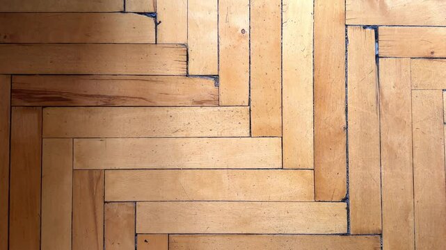 Old vintage parquet in an old house in slow motion top view