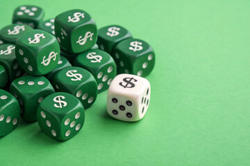 The image displays numerous green dice adorned with white dollar signs and pips, alongside a solitary white die with a black dollar sign and pips, set against a bright green background, representing 