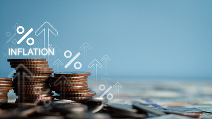 The term inflation on a stack of coins is a concept for the Fed to consider when raising interest...