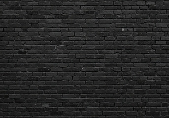 Obraz premium Dark Moody Black Brick Wall Texture: Urban Background, Grunge Design Element for Industrial, Gothic, and Modern Projects