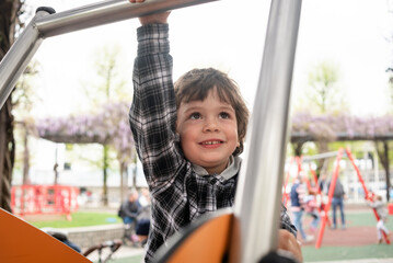 Young boy enjoying playtime at outdoor park