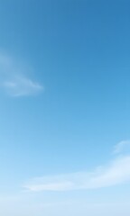 Fototapeta premium Blue sky with wispy clouds.