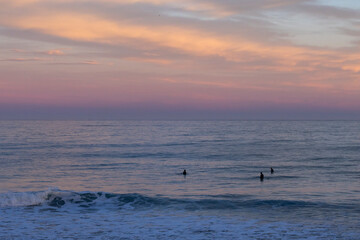 Sunset surf session off coast of Kaikoura, New Zealand