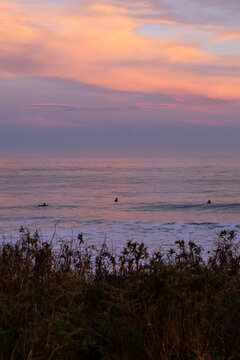 Sunset surf session off coast of Kaikoura, New Zealand