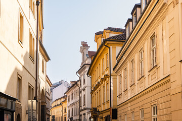 Obraz premium Narrow street of Old Prague with beautiful architecture