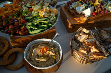 Colorful Coastal Wedding Appetizer Table with Hummus and Veggies