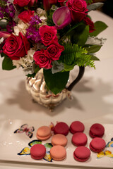 Pink Macarons and Floral Teapot Arrangement at Elegant Bridal Br