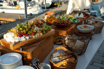 Colorful Coastal Wedding Buffet with Cheese, Fruits, and Cracker