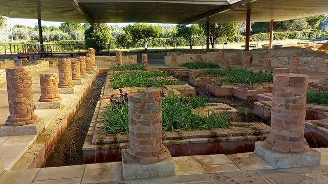 Fountain garden of the Ruins of Conimbriga. Conimbriga was an important Roman city in Hispania, in the imperial province of Lusitania. It was classified as a National Monument in 1910.