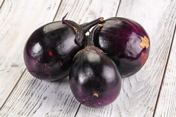 Raw violet and black eggplant