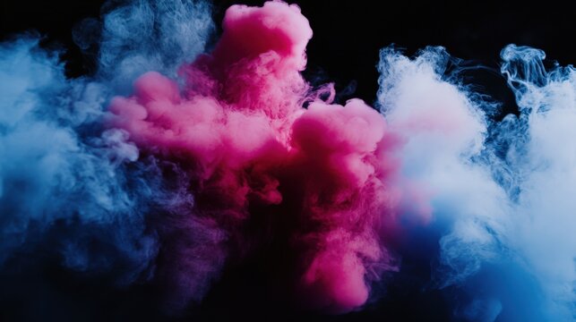 Bright pink and blue smoke clouds against black background, creating dramatic visual contrast.