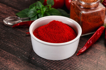 Spicy dry paprika powder in the bowl