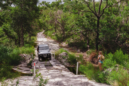 crossing a dodgy bridge on a camping trip