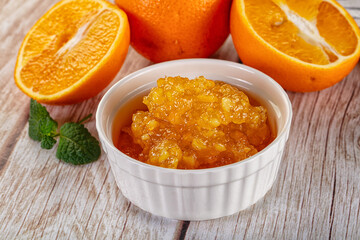 Sweet orange jam in the bowl