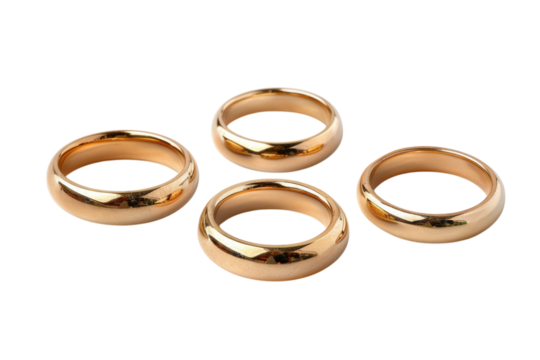 Elegant gold wedding bands arranged on a soft surface, symbolizing love and commitment in a timeless moment of unity isolated on transparent background
