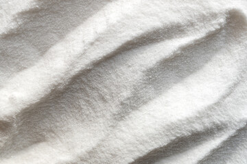 Pile of baking soda on white background