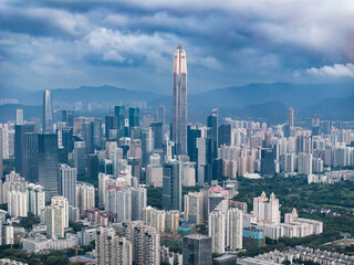 Naklejka premium Shenzhen skyline cityscape with skyscrapers in downtown at sunset twilight in Shenzhen, China