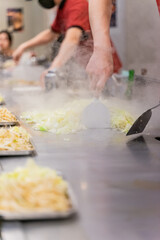 Cabbage teppanyaki is a comforting and flavorful dish that highlights the natural sweetness and crunch of fresh cabbage. Cooked on a sizzling iron plate, the leaves are charred just enough to release