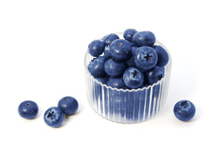 Blueberries in clear bowl isolated on white background