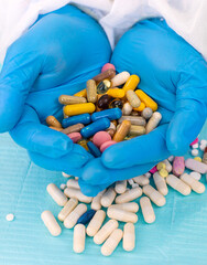 medicines in the hands of a doctor. Selective focus.