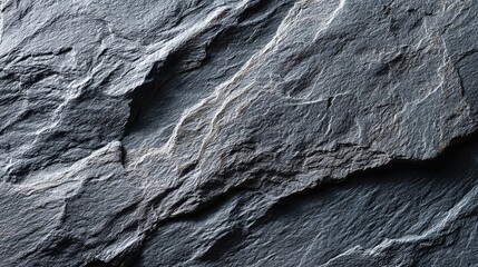 Close-up of Textured Black Slate Surface with High Detail Natural Stone Pattern under Even Studio Lighting - Minimalist Background for Design and Texture Concepts