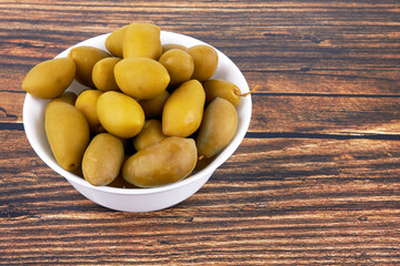 Green olives in bowl