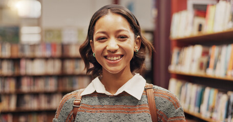 Girl, student and portrait with smile at library, excited or education for development with...