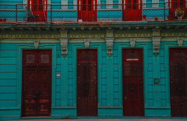 Colorful Colonial Buildings in Havana, Cuba.
Pastel-colored colonial facades in Old Havana with balconies and shuttered windows, captured in soft morning light.
