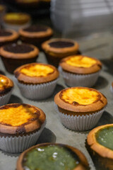 A golden, flaky pastry filled with a silky smooth custard center, egg tarts are a beloved dessert originating from Portuguese and Cantonese traditions. Their rich, creamy filling paired with a buttery