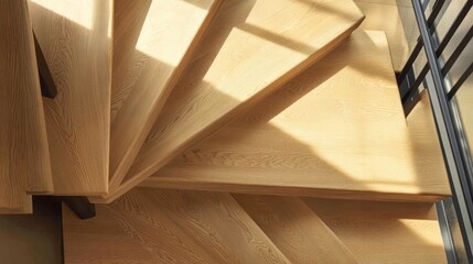 Light-filled spiral staircase with wooden treads