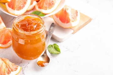 Homemade grapefruit jam in small jar