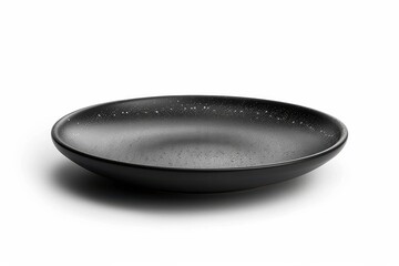 Elegant matte black ceramic plate showcasing minimalist design, perfect for modern dining settings or artistic table arrangements isolated on transparent background