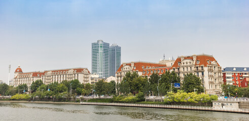 Panorama of historic concession buildings on at the Haihe river in Tianjin, China
