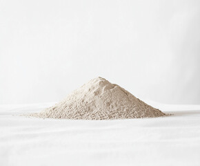 photo of a small mound of sand on a white background
