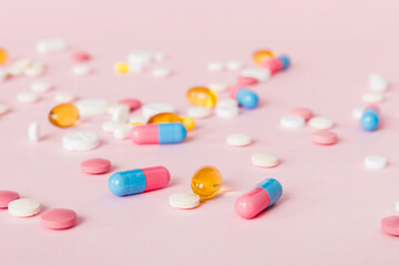 Many different colorful medication and pills perspective view. Set of many pills on colored...