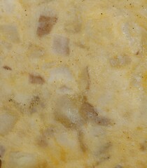Texture of the surface of a Spanish potato tortilla