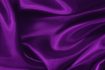 Dark purple fabric texture background, detail of silk or linen pattern.