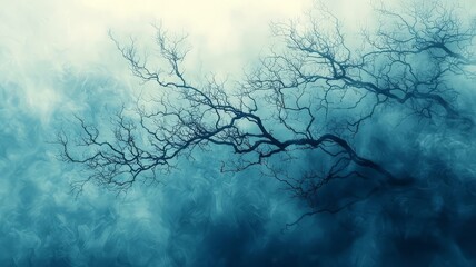 Intricate tree branches silhouetted against a misty blue backdrop, evoking a sense of mystery and tranquility for nature-themed projects.
