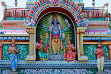 Sculpture of Vishnu or Narayana on a Hindu temple in India.